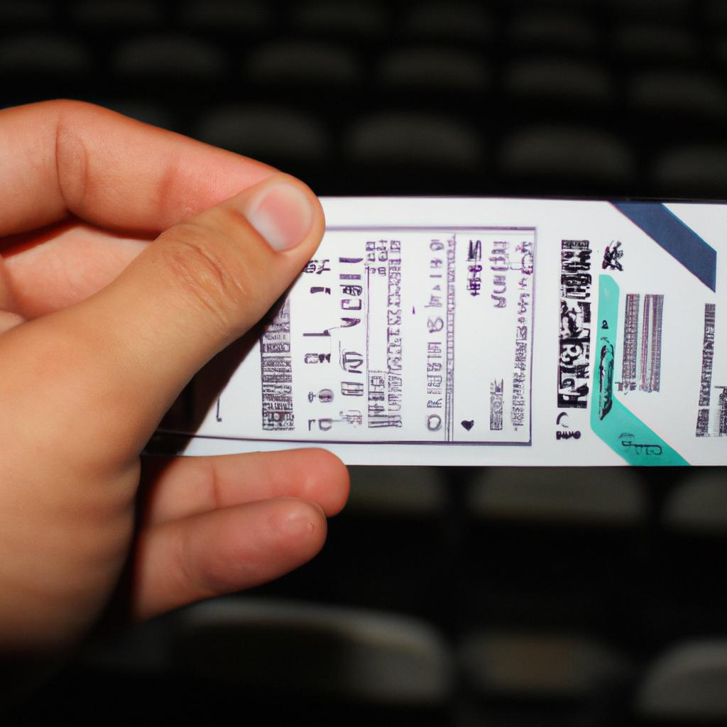 Person holding a football ticket