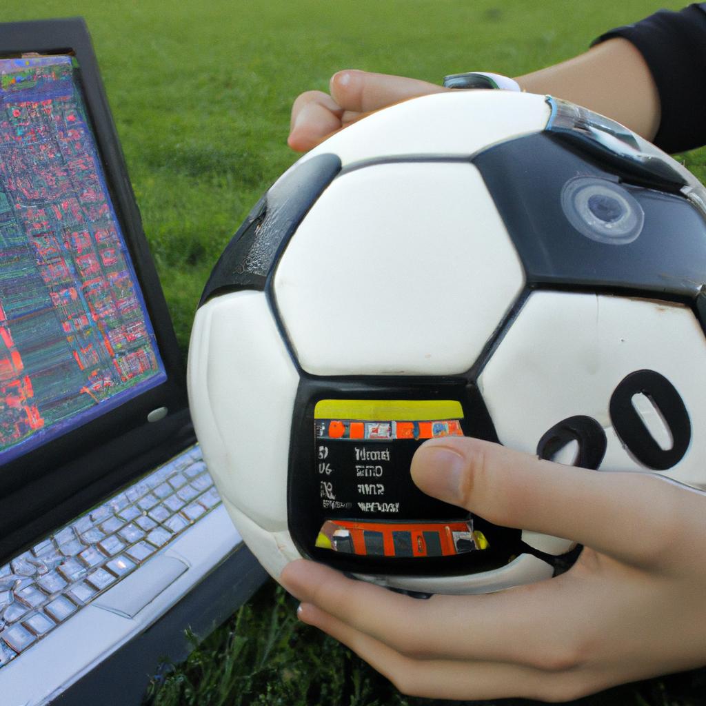 Person holding football, analyzing data